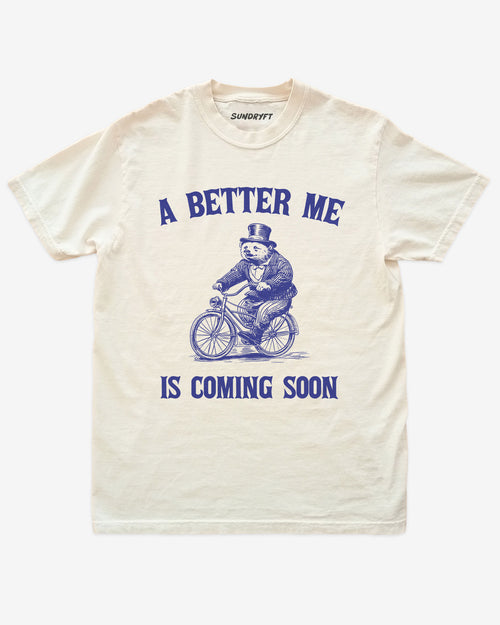 A Better Me Is Coming shirt with retro graphic of bear riding bicycle